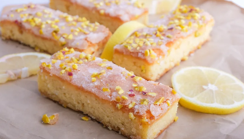 CNF23/08. Gluten free lemon drizzle, almond & pistachio cake slice