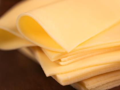 Elite. Extons Monterey Jack Cheese Slices 1kg
