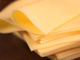 Elite. Extons Monterey Jack Cheese Slices 1kg